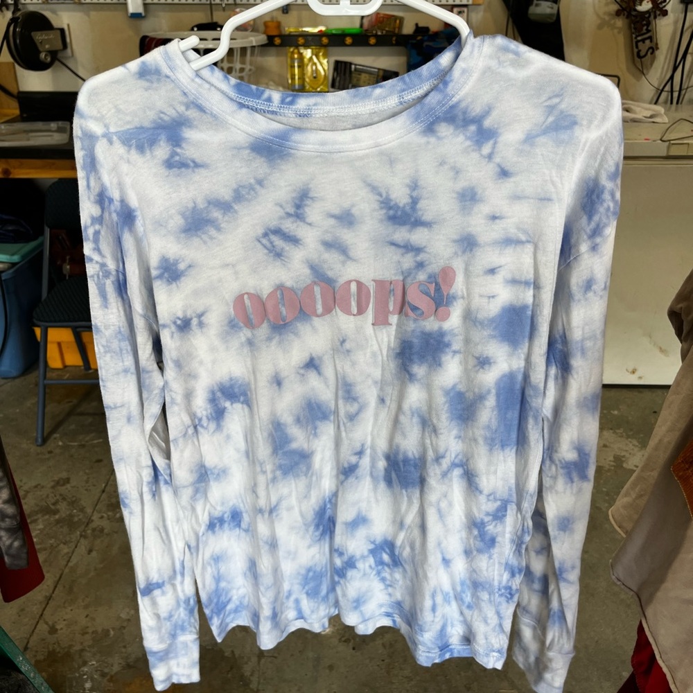 Long sleeve tie-dye shirt with “oops” graphic